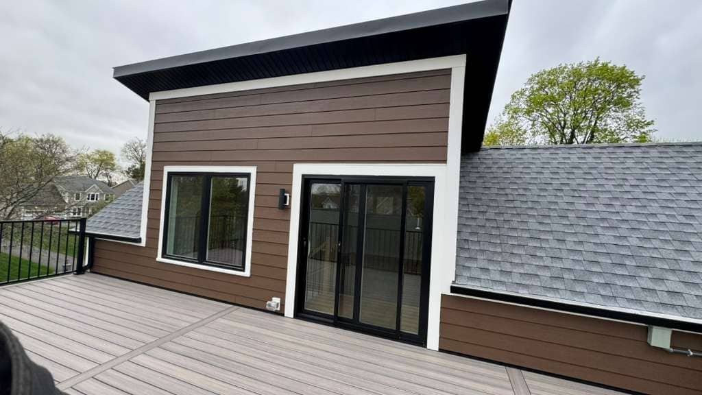 Exterior Home Renovation with New Gray Siding and Stone Entry Steps – Legacy Contractor NJ